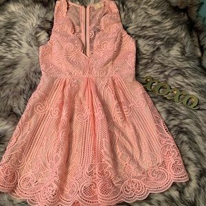 UrbanOutfitters Love Triangle Plunging Lace Romper